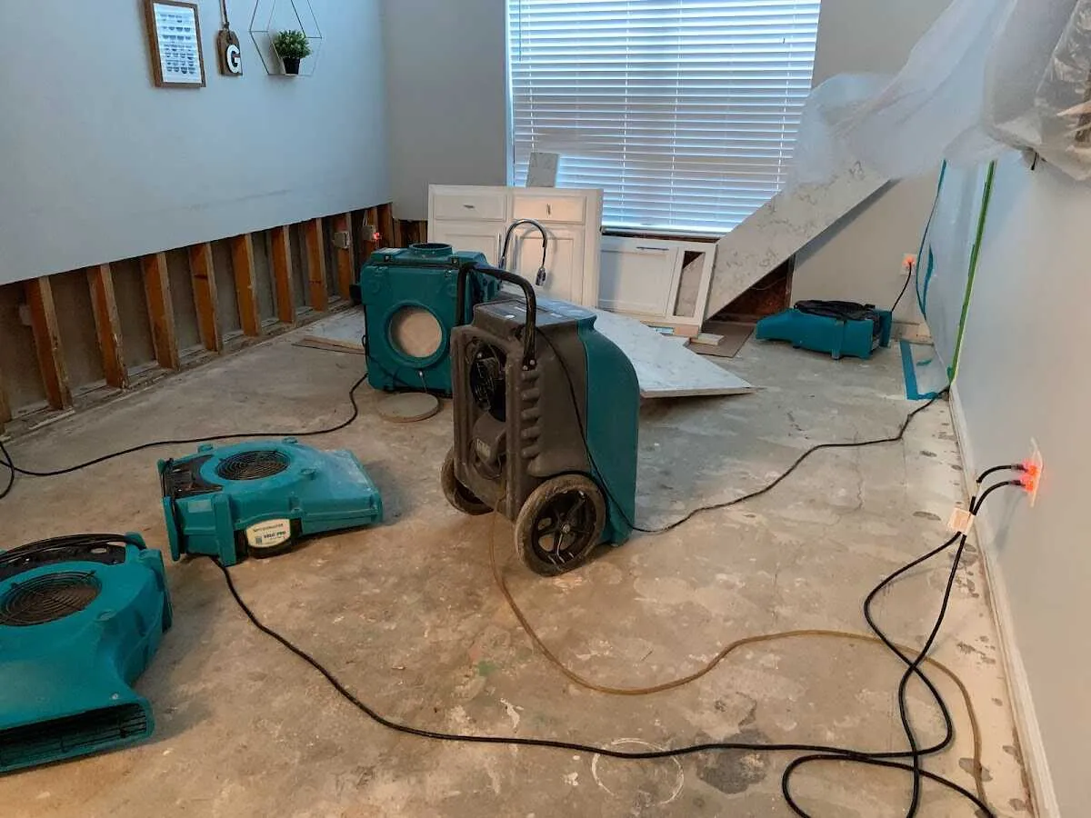 Dehumidifier in flood-cut room for Water Damage Restoration in Taylors